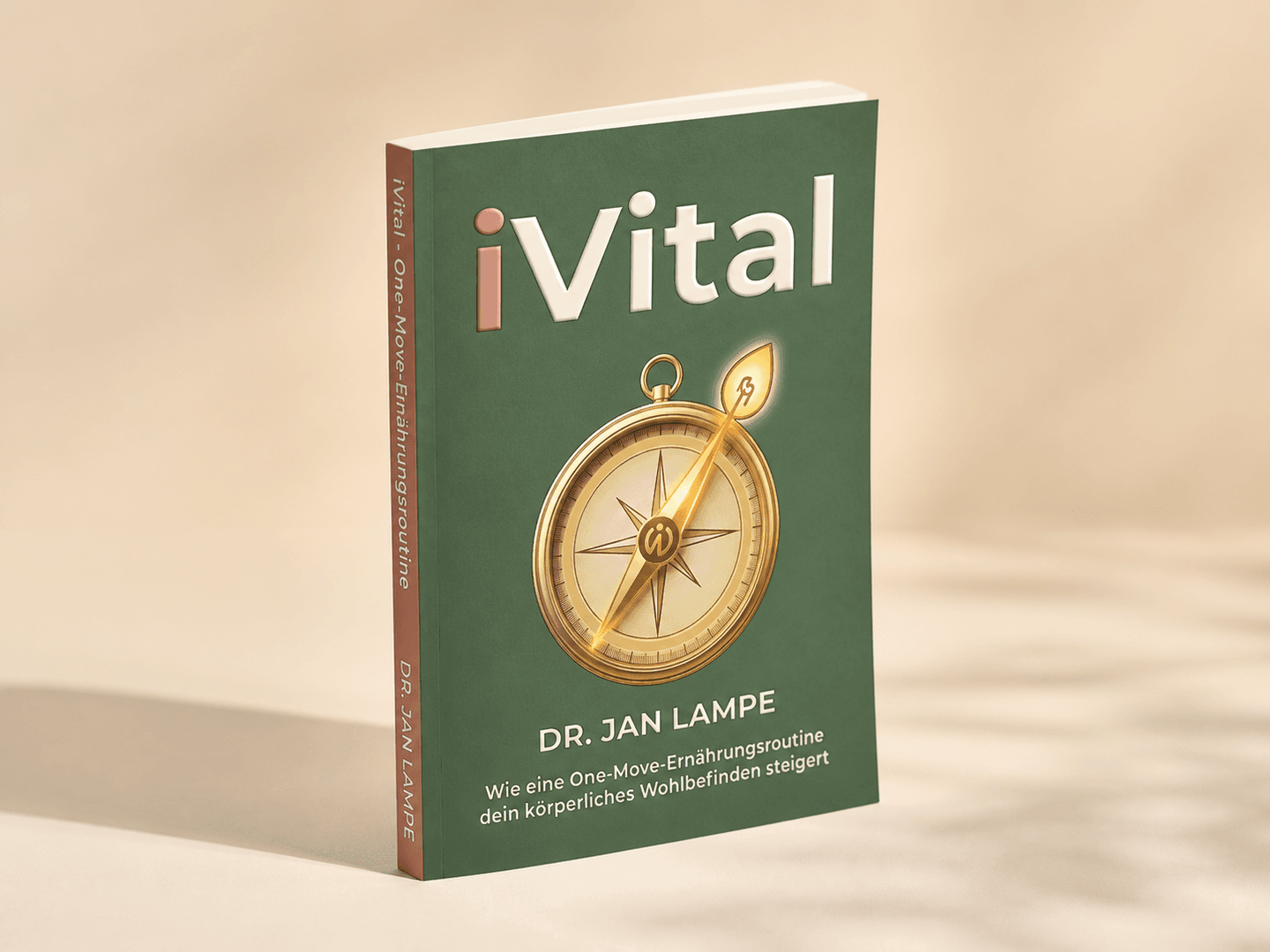 Grünes iVital Softcover von Dr. Jan Lampe mit goldenem Kompassmotiv